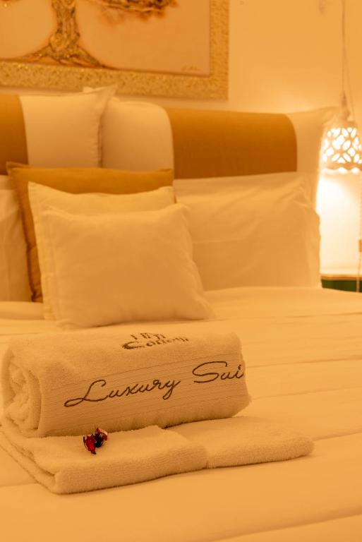 Postel nebo postele na pokoji v ubytování Cadelli Luxury Suite & Apartments
