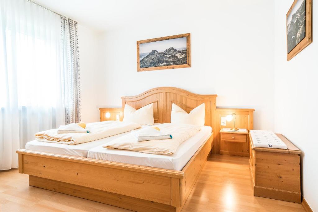 Postel nebo postele na pokoji v ubytování Ferienwohnanlage Oberaudorf