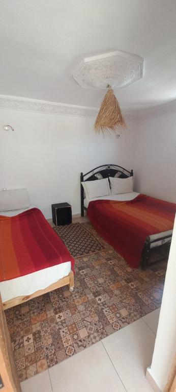 Postel nebo postele na pokoji v ubytování Riad chaoui house