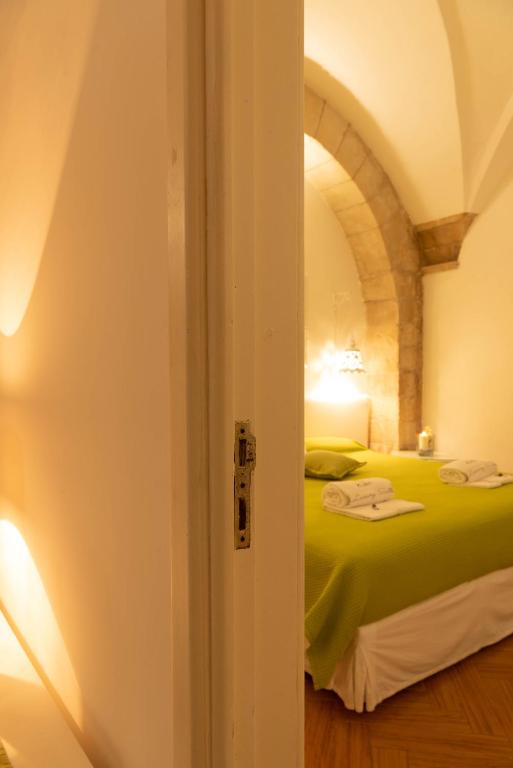 Postel nebo postele na pokoji v ubytování Cadelli Luxury Suite & Apartments