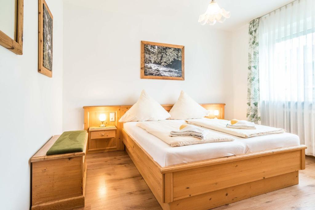 Postel nebo postele na pokoji v ubytování Ferienwohnanlage Oberaudorf