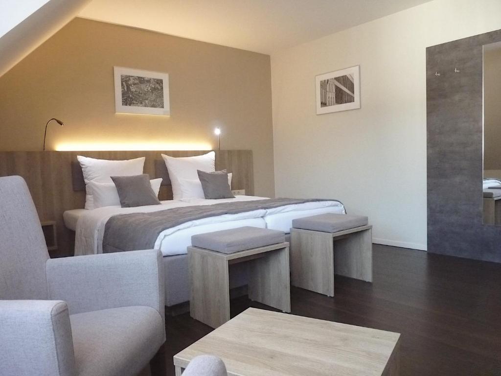Postel nebo postele na pokoji v ubytování Hotel Jellentrup - Adults Only