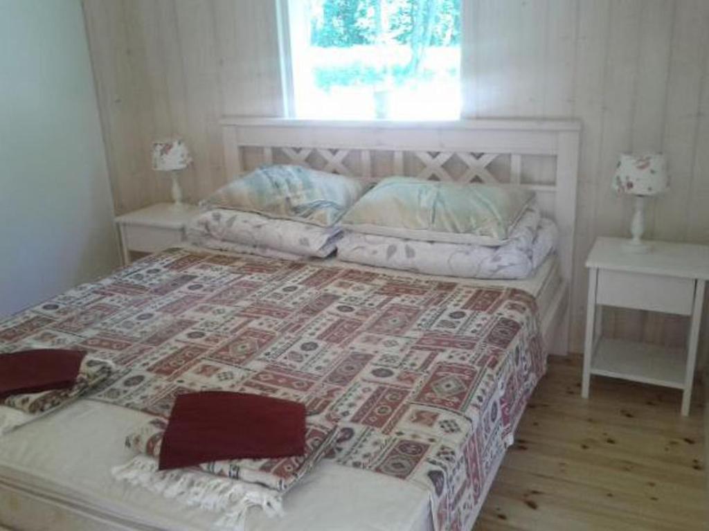 Postel nebo postele na pokoji v ubytování Tirbi Holiday House