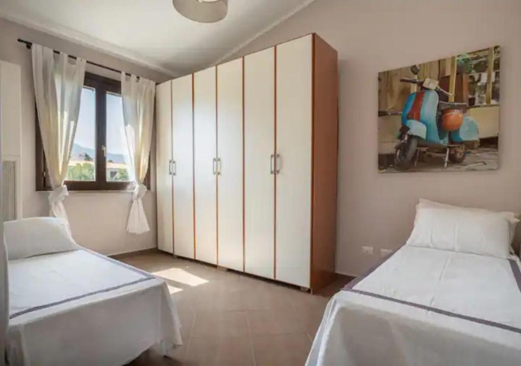 Posteľ alebo postele v izbe v ubytovaní Seaside Villa