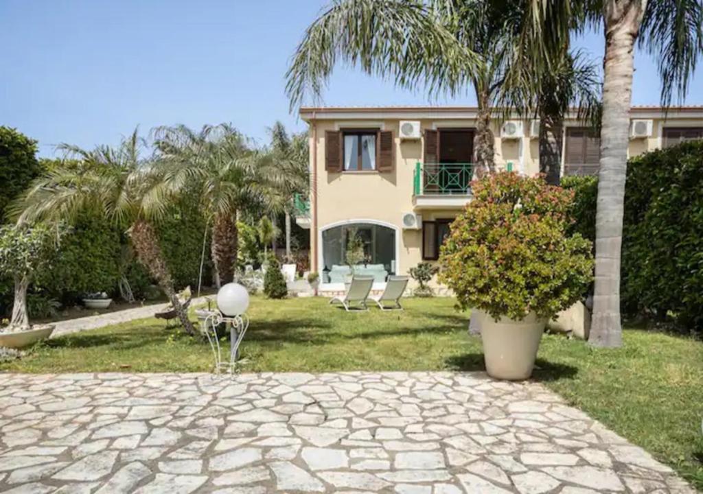 Vonkajšia záhrada v ubytovaní Seaside Villa
