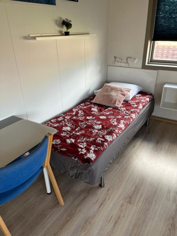 Voodi või voodid majutusasutuse Pavillon Greve toas