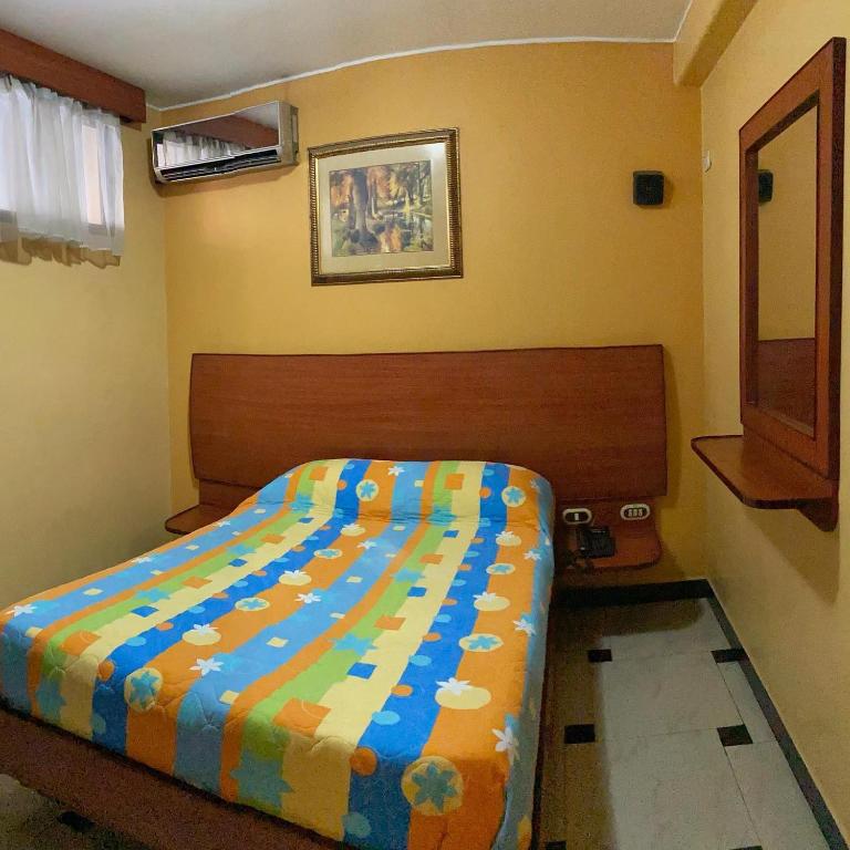 Postel nebo postele na pokoji v ubytování Hostal Montesa