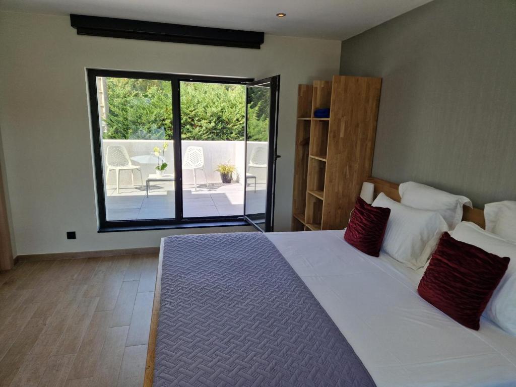 Postel nebo postele na pokoji v ubytování Luxury Zen