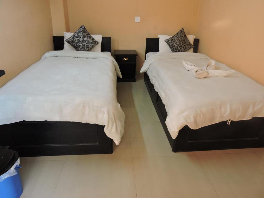 Cama o camas de una habitación en The Eagle Zone