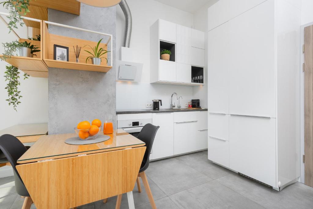 Kuchyňa alebo kuchynka v ubytovaní Kraków Loft