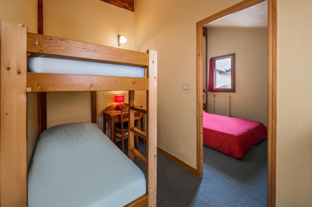 Postel nebo postele na pokoji v ubytování Alpes Roc
