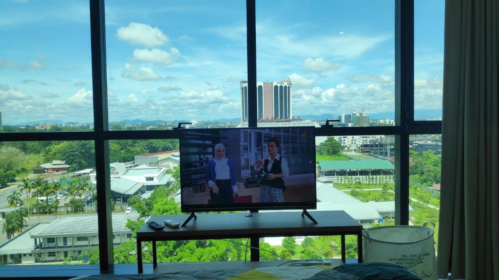 TV a/nebo společenská místnost v ubytování Comfy Studio Kuching