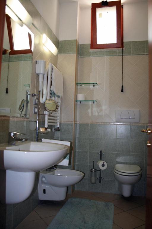 Koupelna v ubytování Grazia Hotel
