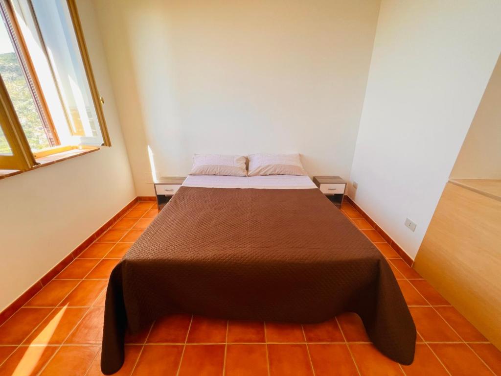 A bed or beds in a room at La bella vista