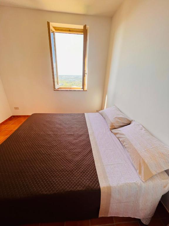 A bed or beds in a room at La bella vista