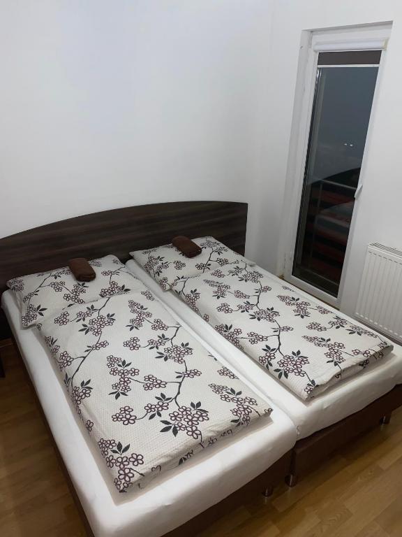 Postel nebo postele na pokoji v ubytování Zajazd Kadar