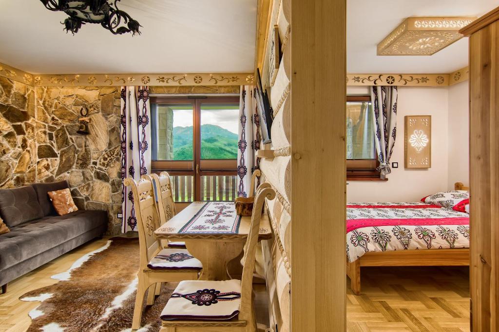 Posteľ alebo postele v izbe v ubytovaní Apartament Sikorówka 1