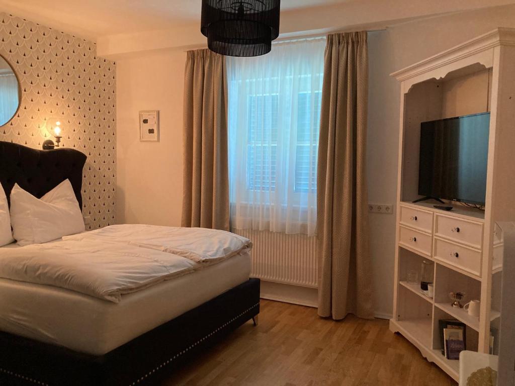 Postel nebo postele na pokoji v ubytování SternenHimmel - Romantik Zimmer !klimatisiert!