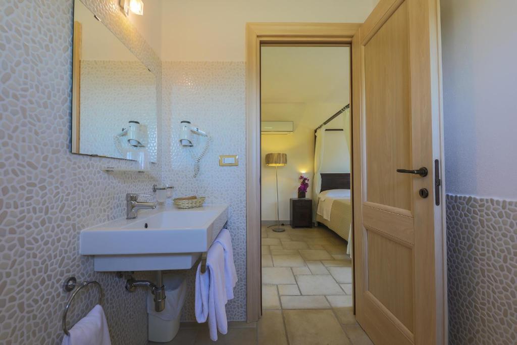 Łazienka w obiekcie Corte Di Ferro Hotel & Wellness Resort