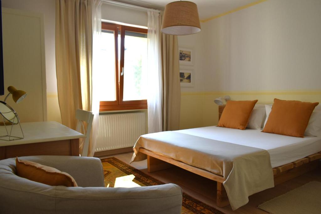 Postel nebo postele na pokoji v ubytování CividaleMia, casa vacanza