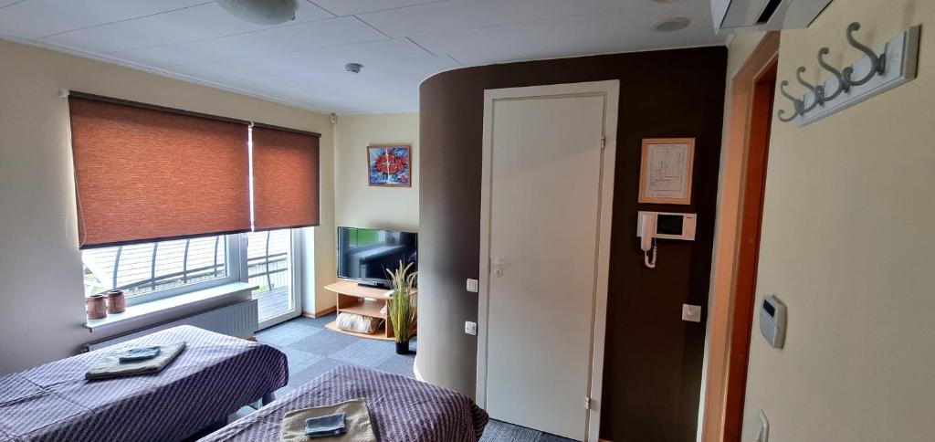 Posezení v ubytování Cinema Hostel Järvakandi