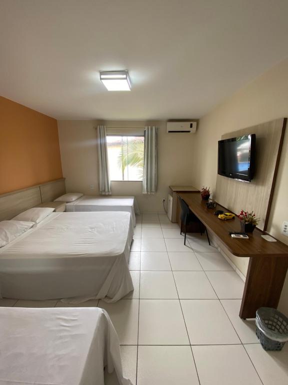 Ένα ή περισσότερα κρεβάτια σε δωμάτιο στο Quarto 124 PortoBello Park Inovar Tur