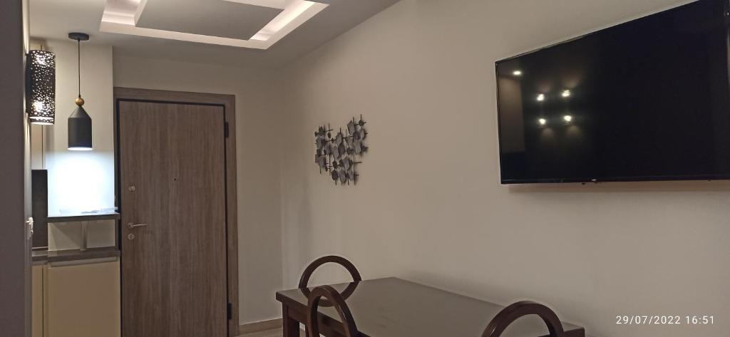 A television and/or entertainment centre at ERODIOS TOWN