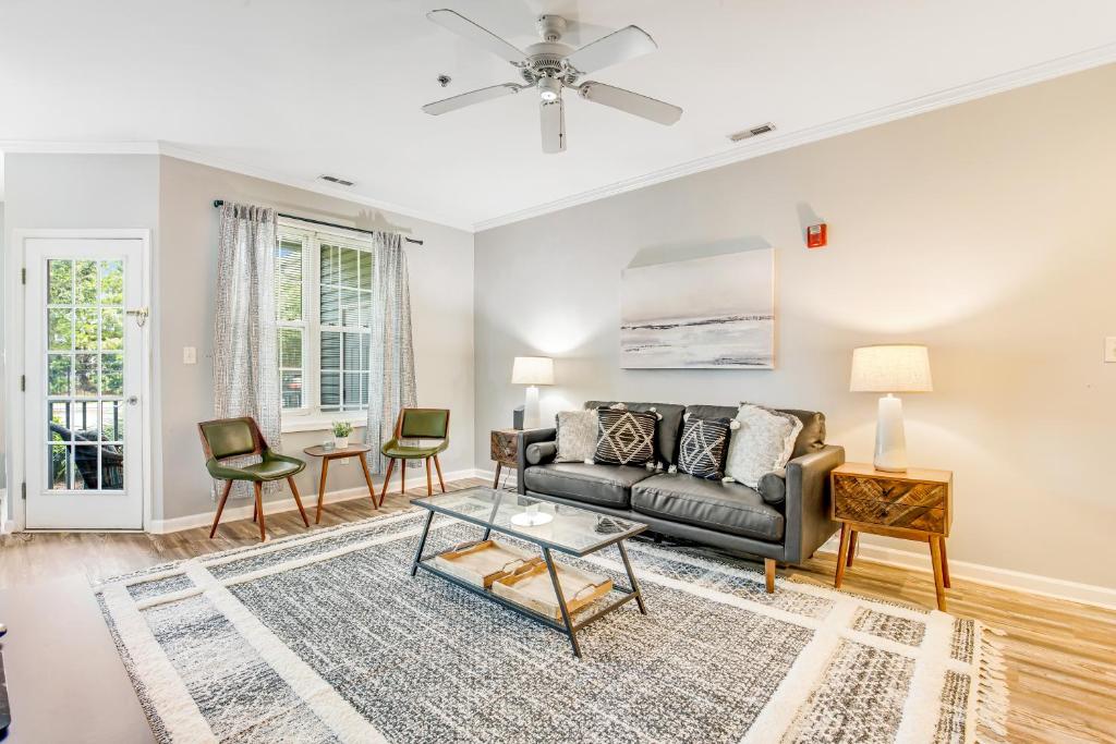 a living room with a couch and a table at Sandpiper Village --- 35552 E Atlantic Cir #101 in Rehoboth Beach