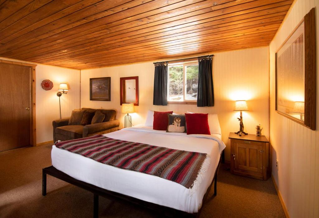 Voodi või voodid majutusasutuse Lochsa Lodge toas