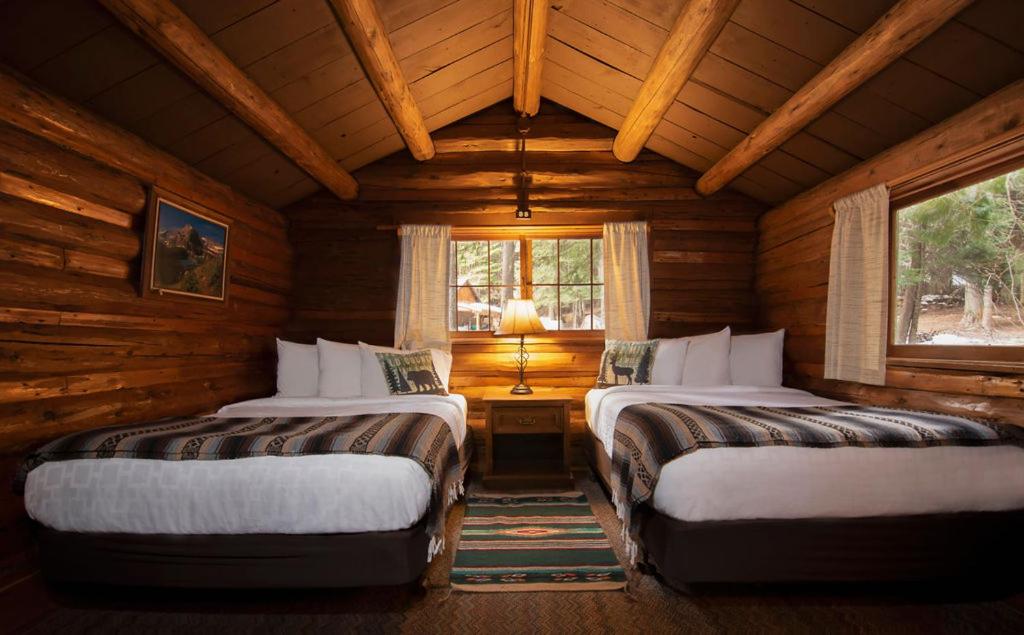 Voodi või voodid majutusasutuse Lochsa Lodge toas