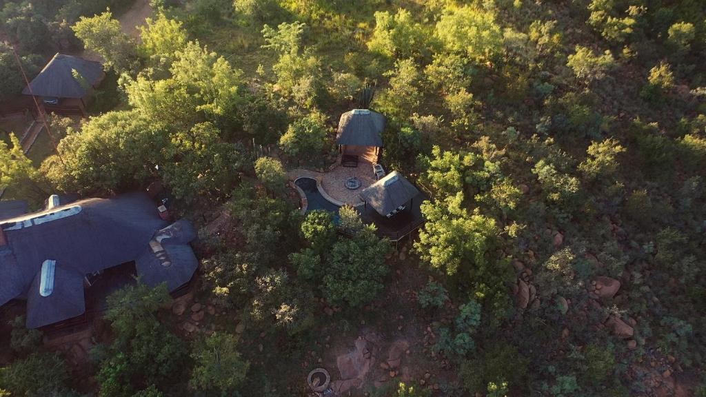 an overhead view of a house in the trees at Bona Kgole Private Game Lodge, Mabalingwe in Warmbaths