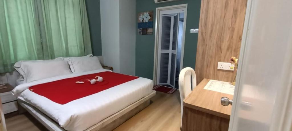 Postel nebo postele na pokoji v ubytování Sunshine Homestay