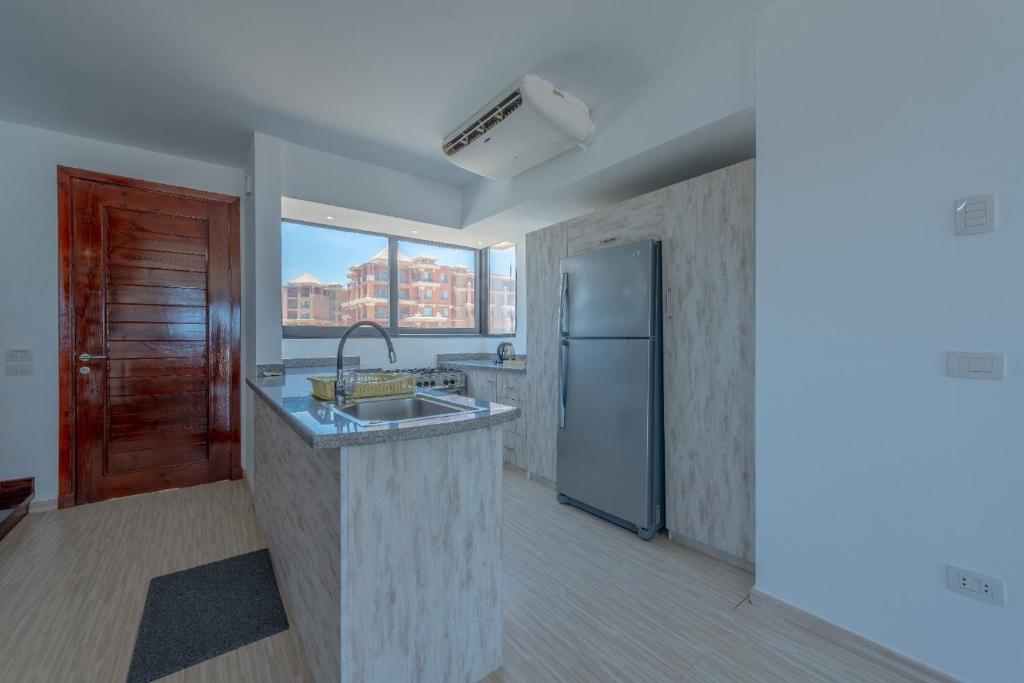 Kuchyň nebo kuchyňský kout v ubytování VESTA - Soma Bay Residence