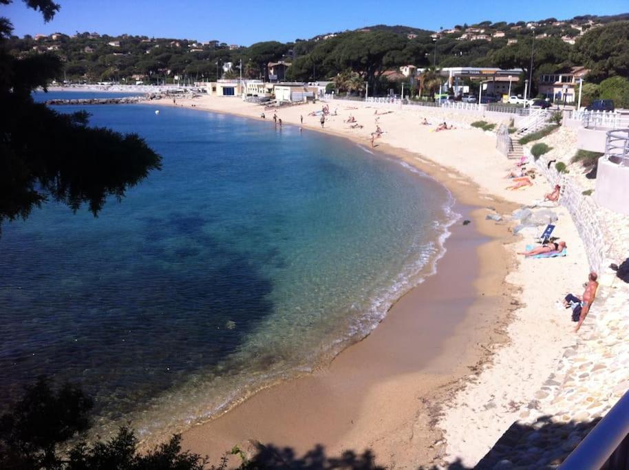 a view of a beach with people in the water at Coquet appartement dans mazet Ste Maxime (Riviera) classé 3 in Sainte-Maxime