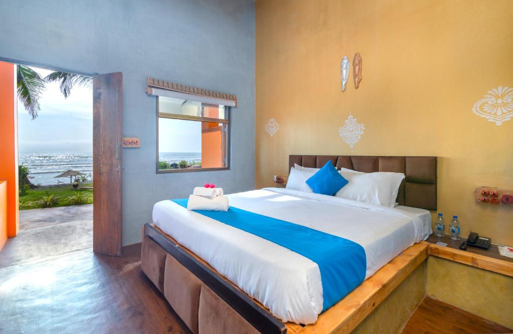 Postel nebo postele na pokoji v ubytování Amadi Beach Front Resort