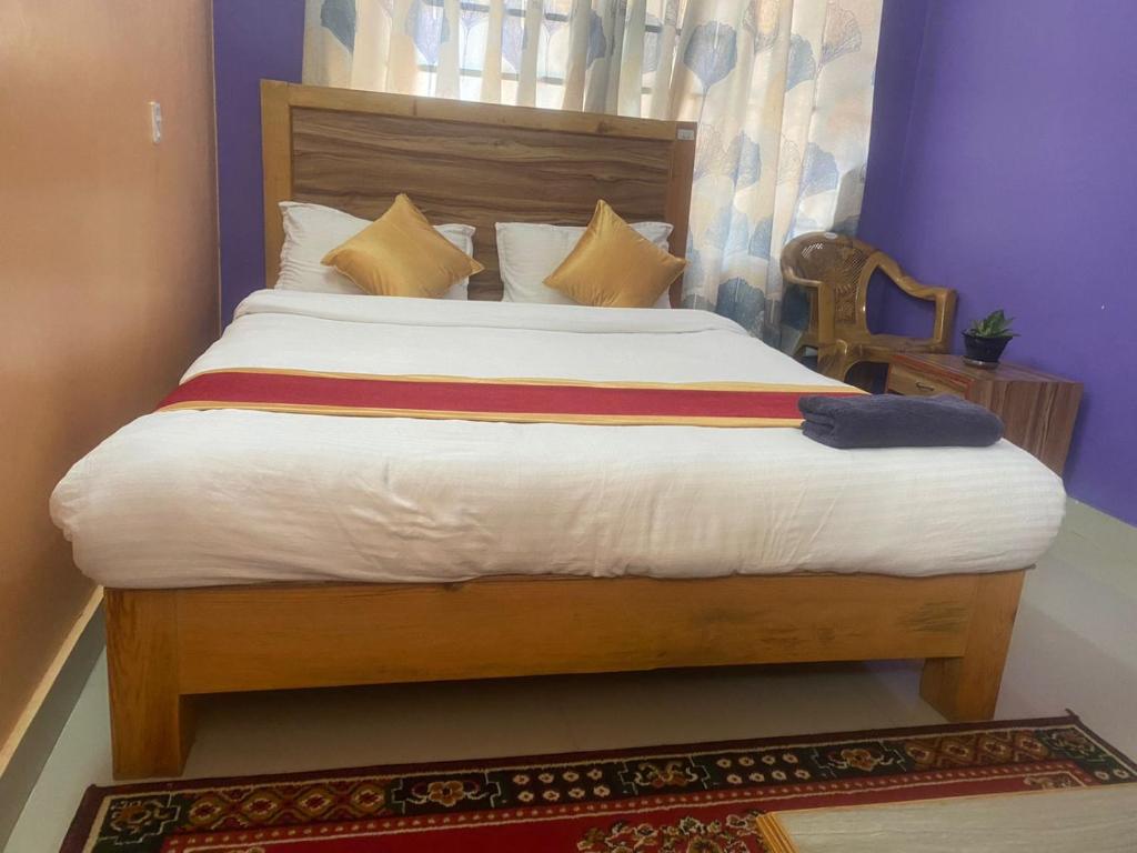 Letto o letti in una camera di Thanapati Guesthouse