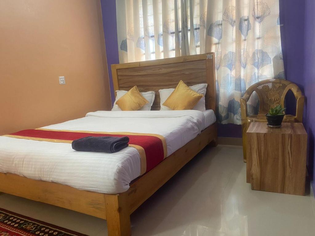 Letto o letti in una camera di Thanapati Guesthouse