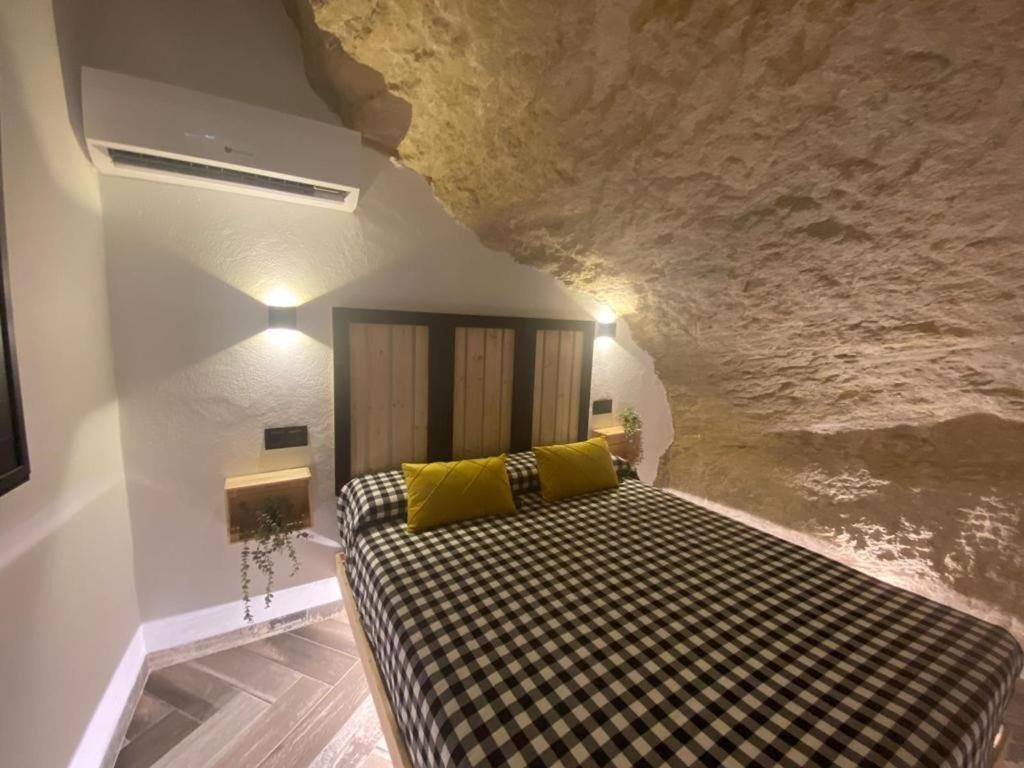 Posteľ alebo postele v izbe v ubytovaní Casa Rural Bajo la Alcazaba