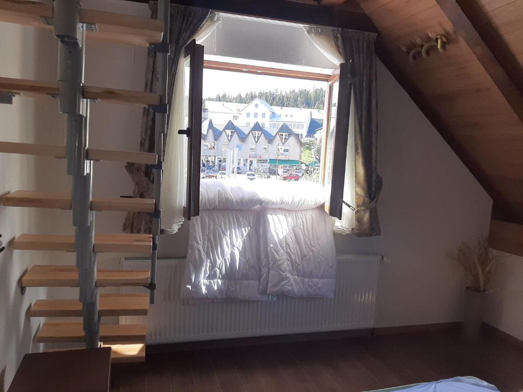Postel nebo postele na pokoji v ubytování Apartments-Rooms Stara Varos