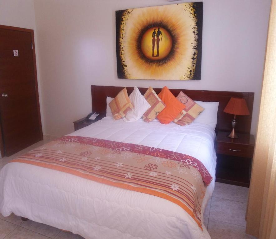 Postel nebo postele na pokoji v ubytování Hotel Air Suites