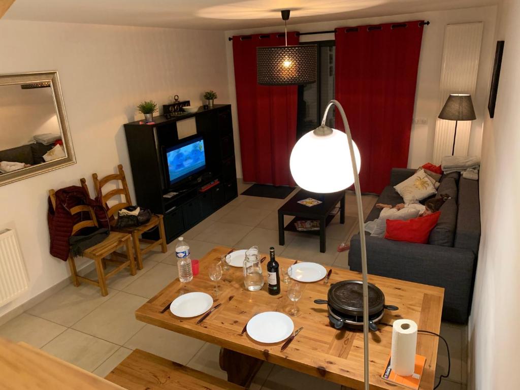 Sjónvarps- og/eða afþreyingartæki á Chalet du parc AX