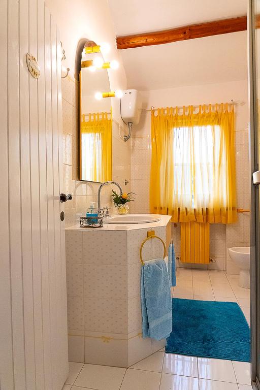 Koupelna v ubytování B&B Glicine