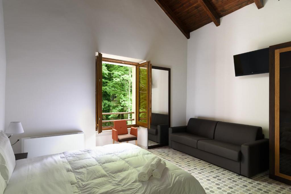 Letto o letti in una camera di Elda Hotel