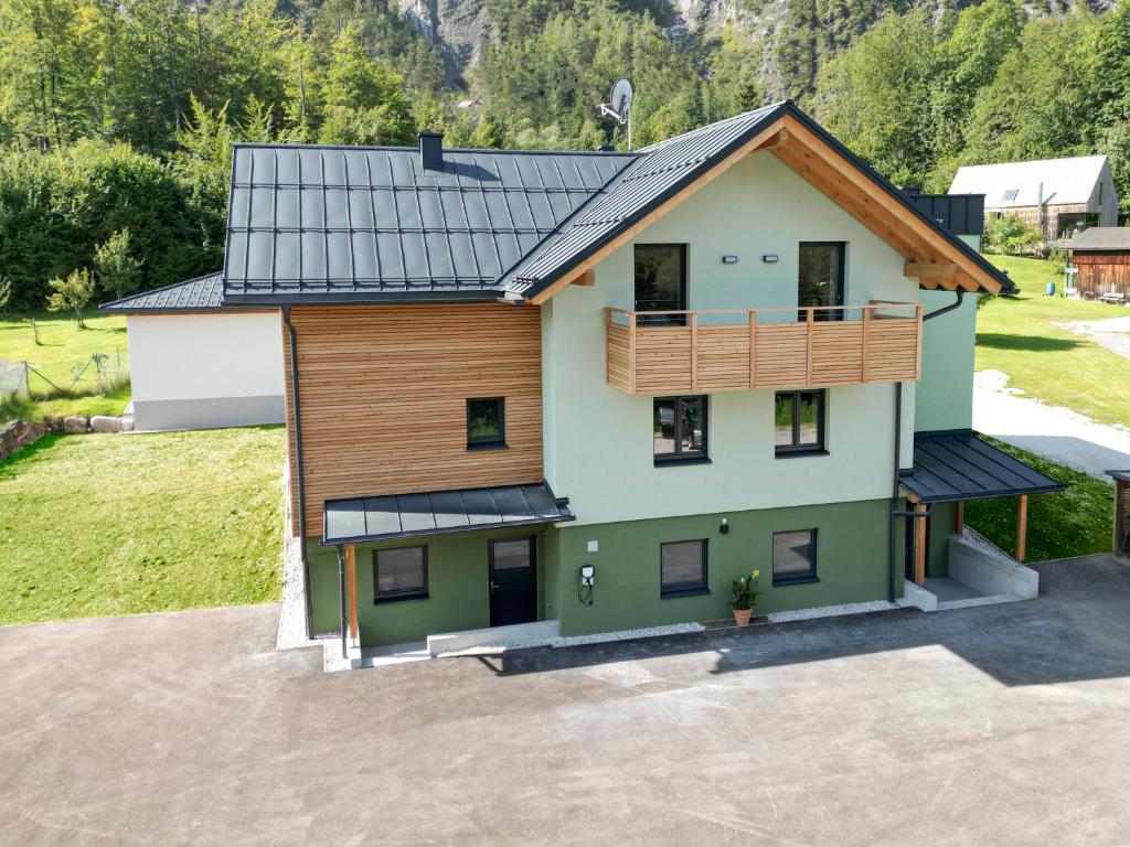 an aerial view of a house with a balcony at good-goisern hotel in Bad Goisern