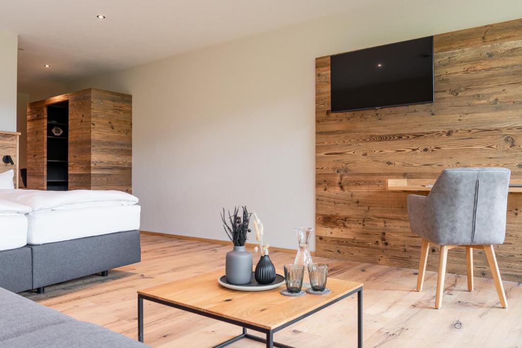 TV a/nebo společenská místnost v ubytování Hotel Bergflair