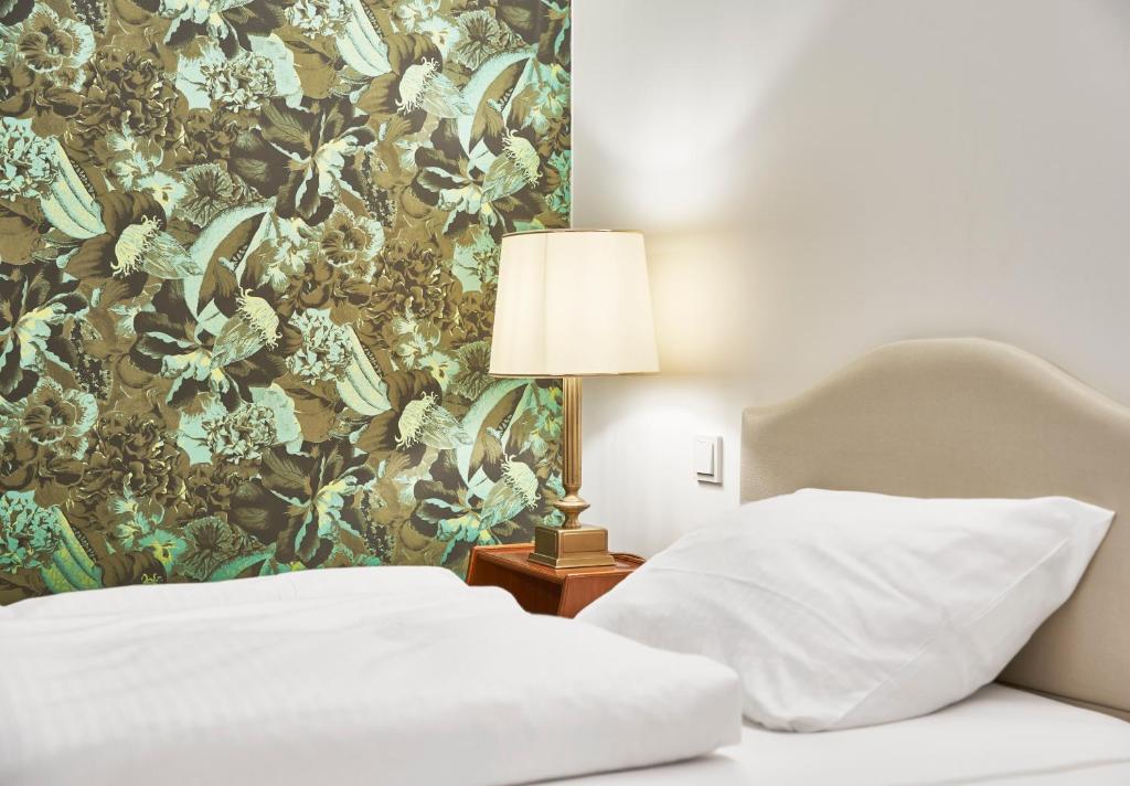 Postel nebo postele na pokoji v ubytování Hotel Kraft