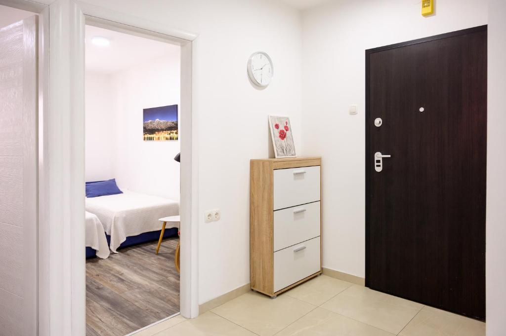 Postel nebo postele na pokoji v ubytování Apartment Tina