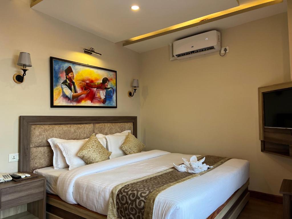 Postel nebo postele na pokoji v ubytování Hotel Kesu Home