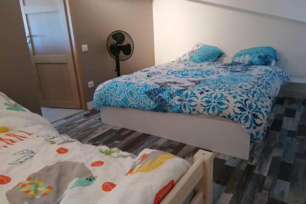 Posteľ alebo postele v izbe v ubytovaní Splendide appartement vue océan le Penon