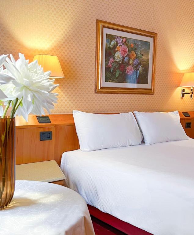 Postel nebo postele na pokoji v ubytování Hotel Motel Top